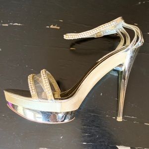 Gold shapely platform Rhinestone sexy heels.